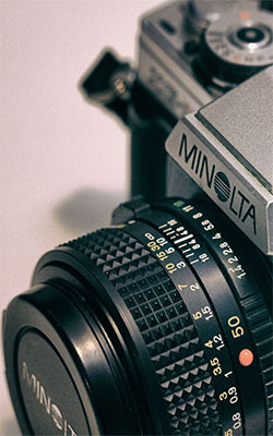 Minolta Camera Retro Mobile Wallpaper Preview