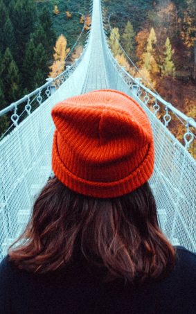 Girl Crossing Mountain Bridge HD Mobile Wallpaper