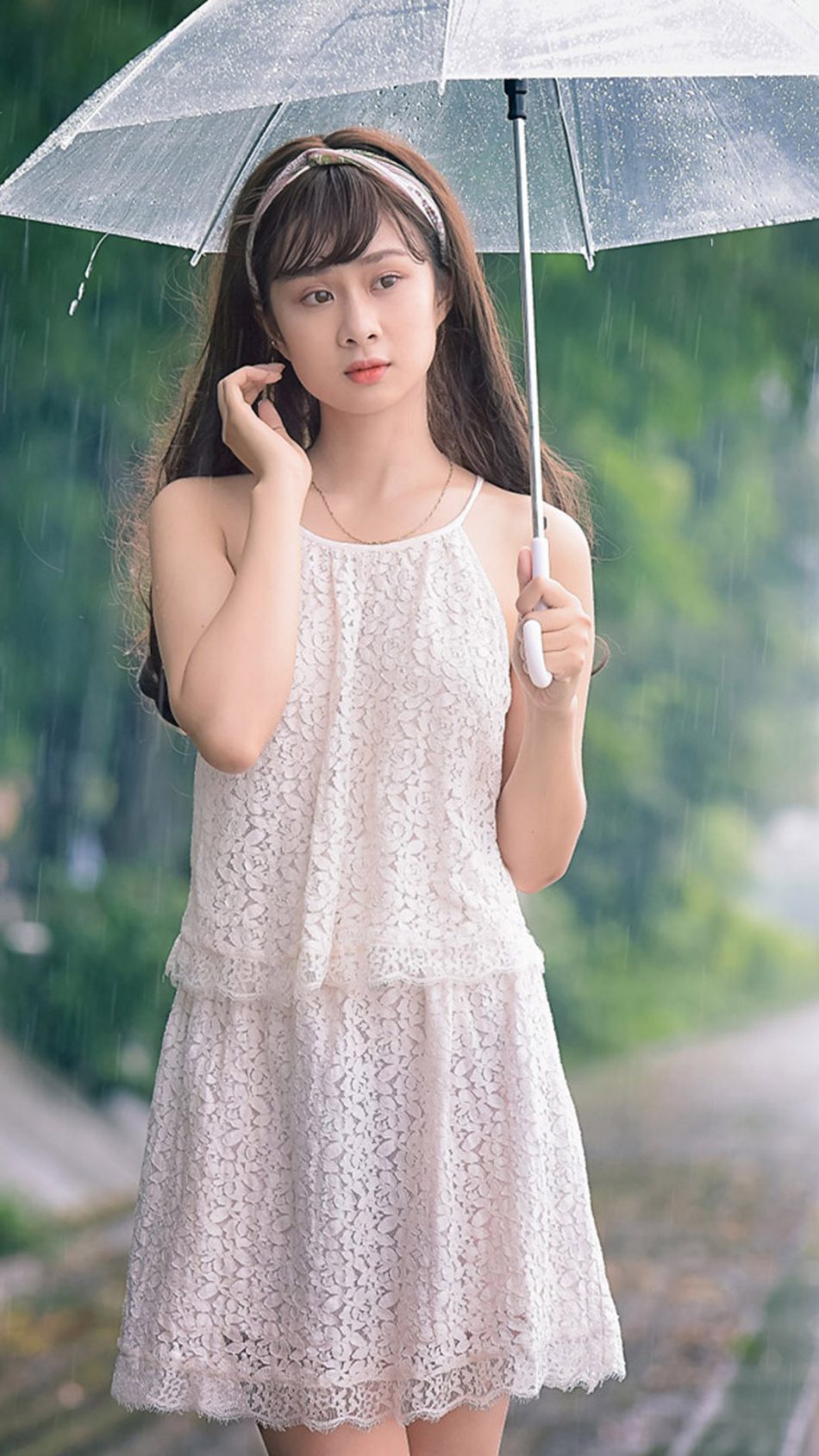 Cute Asian Girl Posing In Rain 4K Ultra HD Mobile Wallpaper