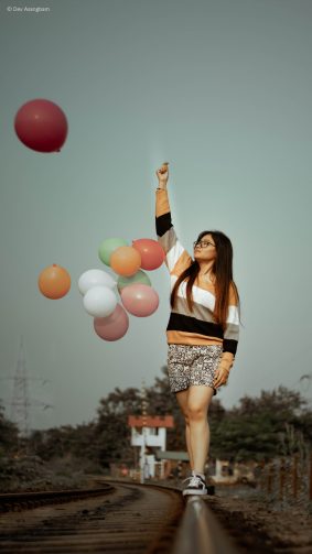 Asian Girl Balloons Train Track Photography 4K Ultra HD Mobile Wallpaper