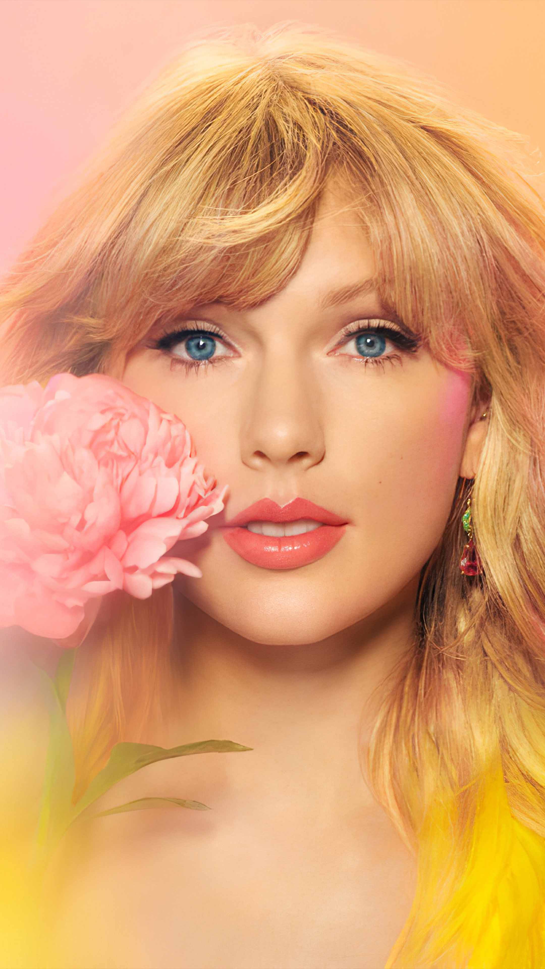 Beautiful Taylor Swift With Flower 4k Ultra Hd Mobile Wallpaper