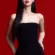 K-Pop Singer Jennie In Black Dress Red Background 4K Ultra HD Mobile Wallpaper